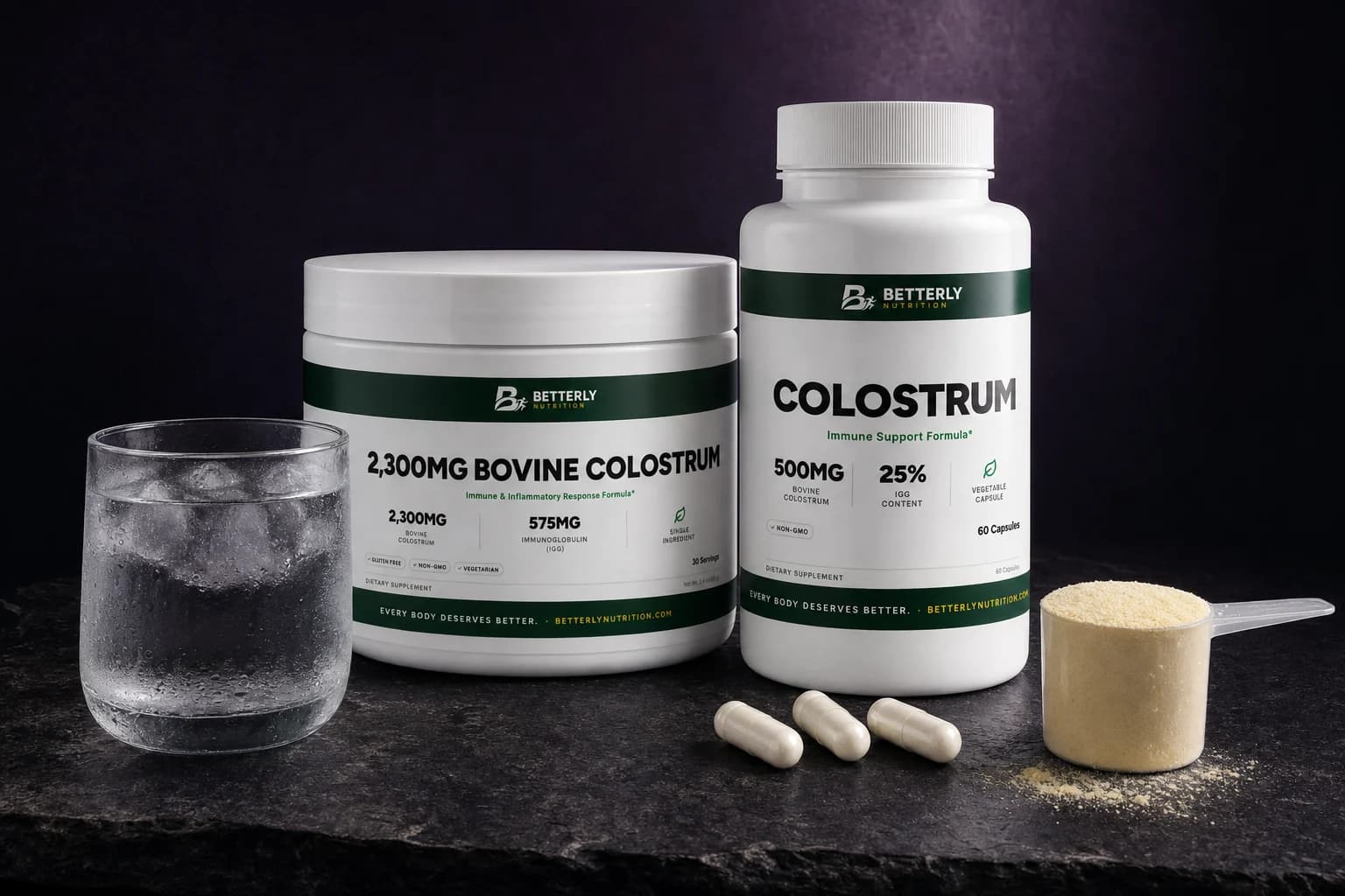 2,300mg Bovine Colostrum tub and Colostrum capsule bottle on dark slate with three capsules, a scoop of powder and iced water