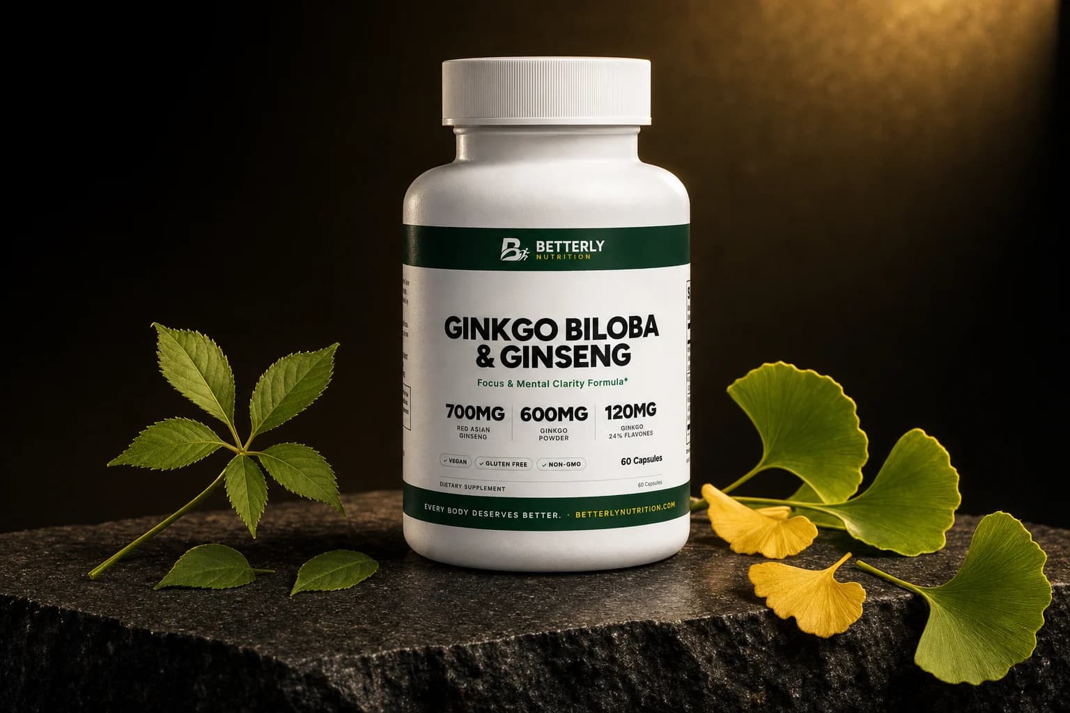 Ginkgo Biloba & Ginseng Capsules bottle on dark granite with a ginseng leaf sprig at left and green and yellow ginkgo leaves at right