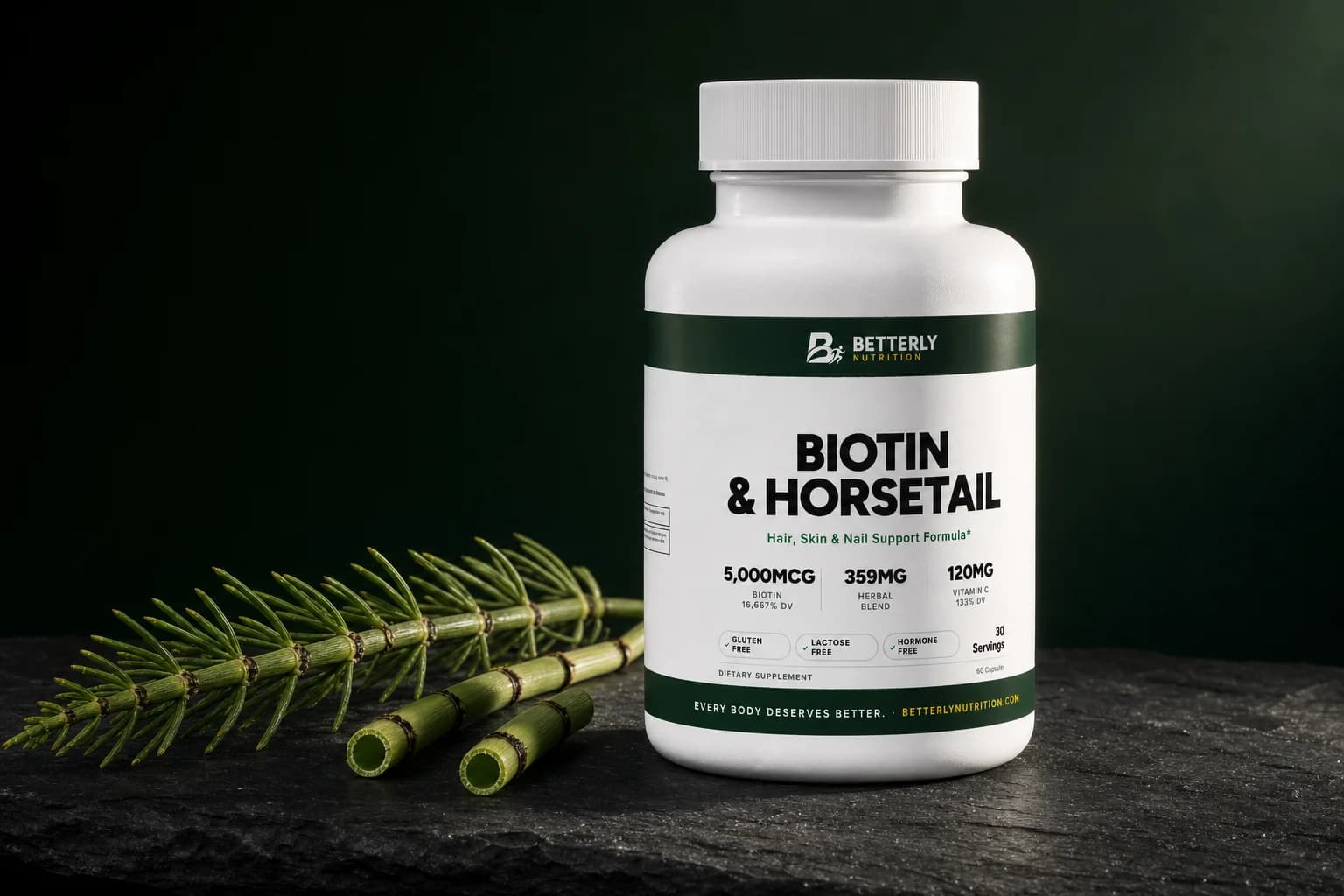 White Biotin & Horsetail Hair Capsules bottle on dark stone beside jointed green horsetail stems and two hollow cut stem sections