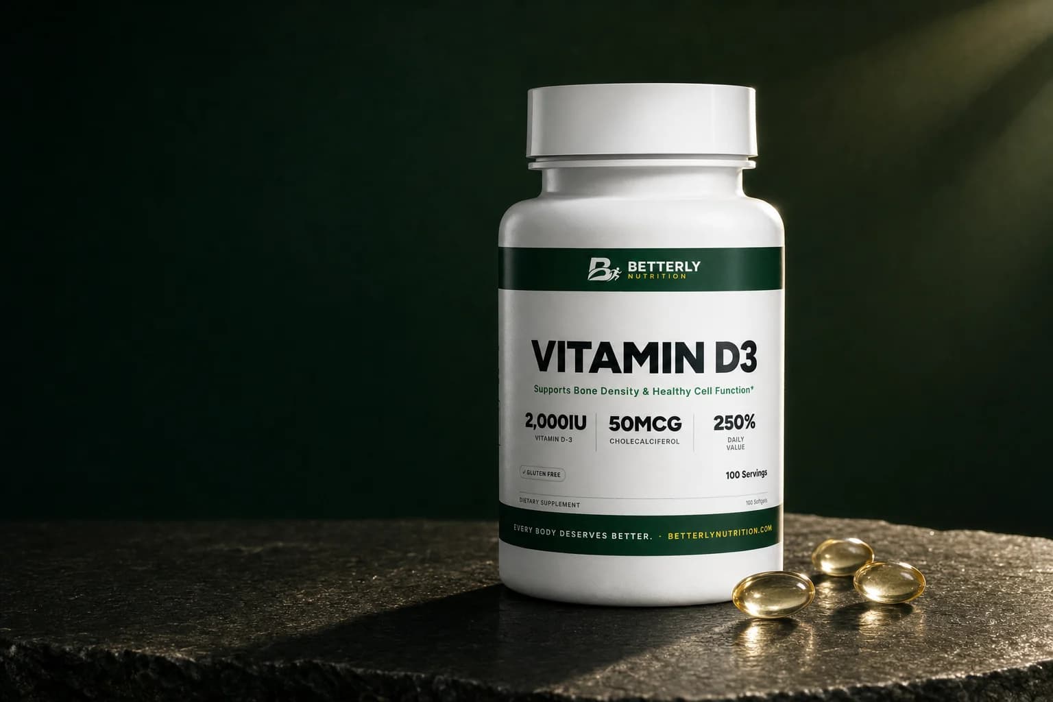 Vitamin D3 Softgels bottle and three loose gold softgels on dark granite, a warm beam of light slanting in from the upper right