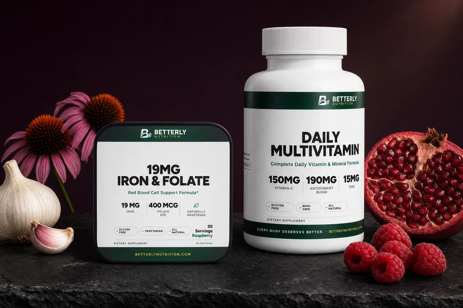 19mg Iron & Folate Strips tin and Daily Multivitamin Capsules bottle on dark slate with echinacea, garlic, pomegranate and raspberries